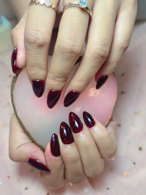 Plum almond nails